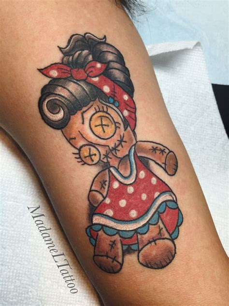 Exploring the Feminine Side of Voodoo Doll Tattoos